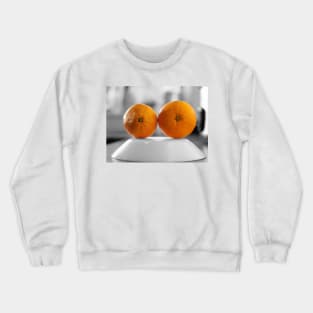 Oranges with a black and white background set on the plate Crewneck Sweatshirt